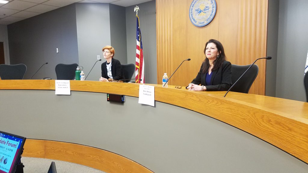 (L-R) 13th District Democratic congressional candidates Stefanie Smith and Betsy Dirksen Londrigan, at a Feb. 11 candidate's debate in the Champaign City Council chamber.