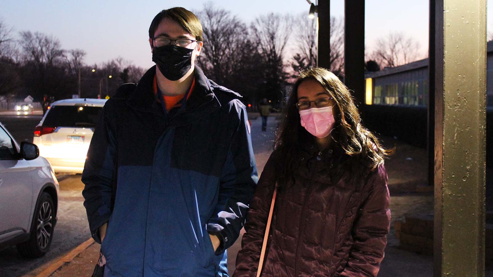 Two teachers stand outside Jefferson Middle School