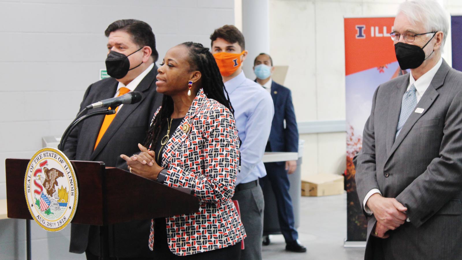 Rep. Carol Ammons speaks at a podium.